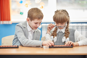 first graders in an arithmetic lesson