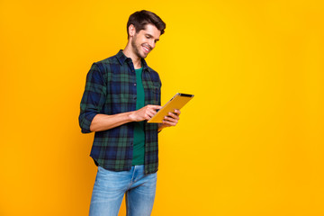 Profile photo of cool guy with e-reader in hands watching webinar wear casual checkered shirt...