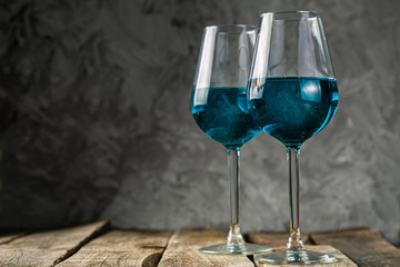 Food trend blue wine on rustic background, copy space