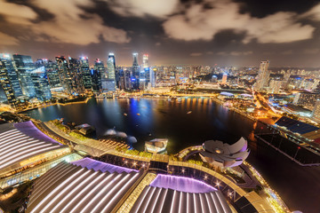Fototapeta na wymiar Fantastic night aerial view of Marina Bay in Singapore