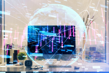 Double exposure of forex graph and work space with computer. Concept of international online trading.