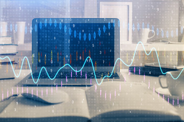 Financial graph colorful drawing and table with computer on background. Multi exposure. Concept of...