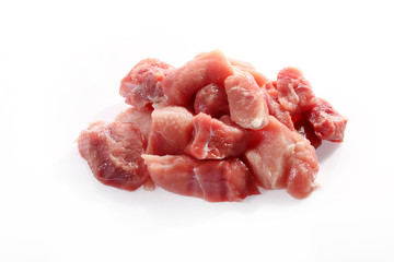 Pork, meat for goulash. Raw meat on a white background.