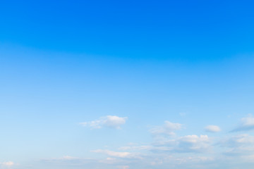 Obraz premium blue sky background texture with white clouds.