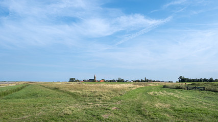 Distant view on the village Oosterland at Wieringen in The Netherlands