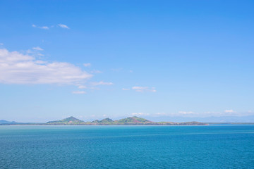 The sea with blue sky and white clouds