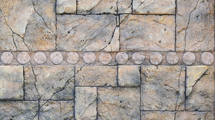texture, stone wall consisting of stone blocks of various shapes