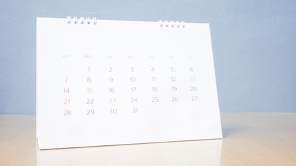 Calendar page on pastel tone.