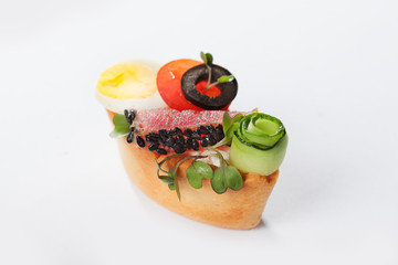 The round shape of the unleavened dough is filled with a snack of berries and cheese. Capacity of dough for toppings. View from above. Copy space