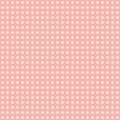 Seamless pattern of small white flowers on a pink background.