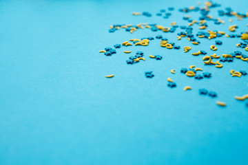Fototapeta premium topping in the form of the moon and stars on a blue boom