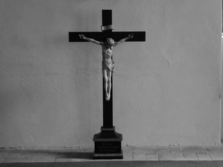 A cross with jesus on it in the monastery chorin.