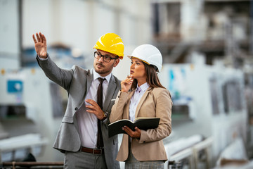 Man and woman discussing work