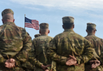 American Soldiers and Flag of USA. US Army. Veteran Day - obrazy, fototapety, plakaty