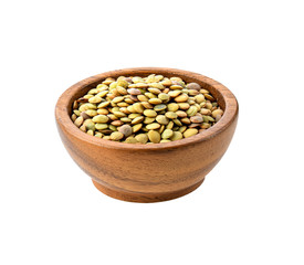 lentils in  wooden  cup isolated on white background