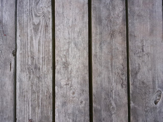 Background of old wood. Old wooden construction. Natural aging.