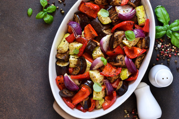 Oven Roasted Vegetables: zucchini, eggplant, tomatoes, paprika. Ratatouille is a rustic dish of vegetables.