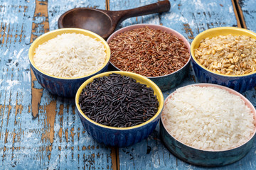 Different types of rice, white basmati, jasmine, arborio, brown and black