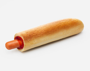 French hod dog with sausage and ketchup.