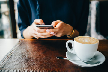 Close-up of a woman in a cafe