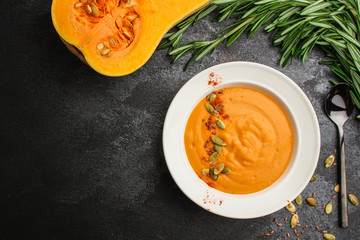 pumpkin soup (first course, delicious vegetable vitamin food) menu concept. food background. copy space. Top view