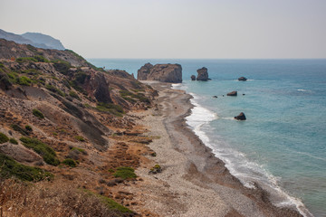 view of Petra tou Romiou beach, famous touristic landmark Aphrodite's rock, Pafos, Cyprus, Greece 