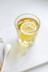 chamomile tea on marble background with copy space. Relax concept