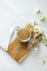 chamomile tea on marble background with copy space. Relax concept