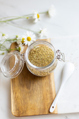 chamomile tea on marble background with copy space. Relax concept