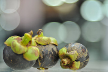 Mangosteen lamb is seen inside. Mangosteen fruit seasonal Meat is used as a healthy food.Lay on glass table with text space.