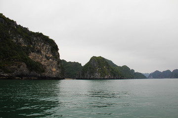 Cliffs out of the water in the bay near Cat Ba island in Vietnam
