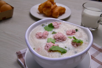 Minced pork congee, Breakfast for asian  providing hot deliciousness, using deep-fried doughstick and milk.