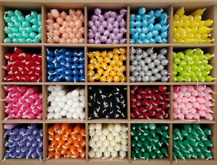 colored candles photographed from the front