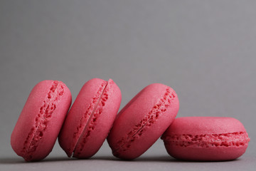 Macaroons of pink color tasty french cookies beautiful macro food photo