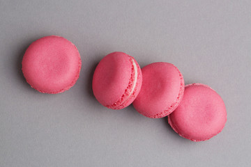 Macaroons of pink color tasty french cookies beautiful macro food photo