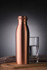 Copper Water Bottle and Glass of Water for Environment Friendly Use