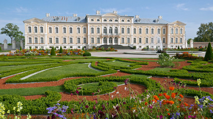 Rundale, Latvia - September 10, 2019: View on the front of the Rundale Palace. It is the most important baroque palace in Latvia. The French gardens and a large park are fenced.
