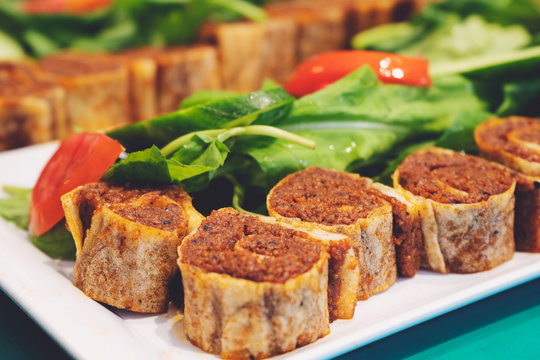 Cig kofte, a raw meat dish in Turkish and Armenian cuisines. Turkish cig means "raw" and kofte means meatball.