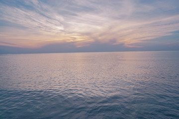 Fototapeta na wymiar Beautiful sunrise sky over sea.