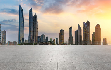 Shanghai commercial center building scenery and empty square floor at sunset,China.