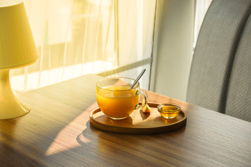 tea, honey, lemon and sea buckthorn (aromatic mustard drink in a cafe restaurant) menu concept. food background. copy space. Top view