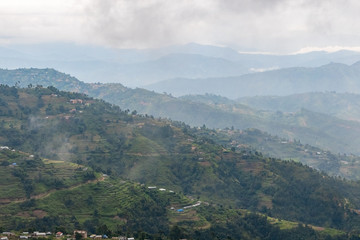 Fototapeta na wymiar Hills covered by clouds and fog during rainy season