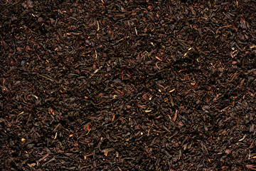 The texture of black dry tea.