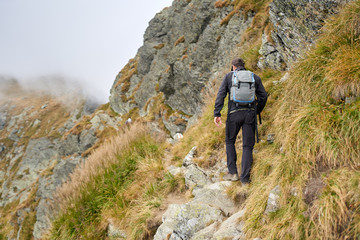 Man with backpack hiking