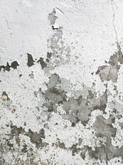 Stucco cracked on the wall as abstract background