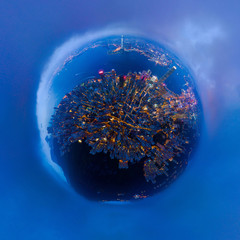 Little planet 360 degree sphere birds eye view. Panoramic view of aerial view of Hong Kong Downtown. Financial district and business centers in technology smart city. skyscraper and buildings at night
