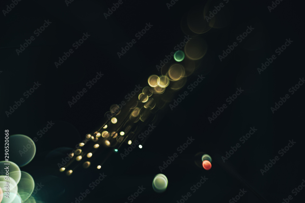 Poster Beautiful abstract optical light bokeh  on a glow background.