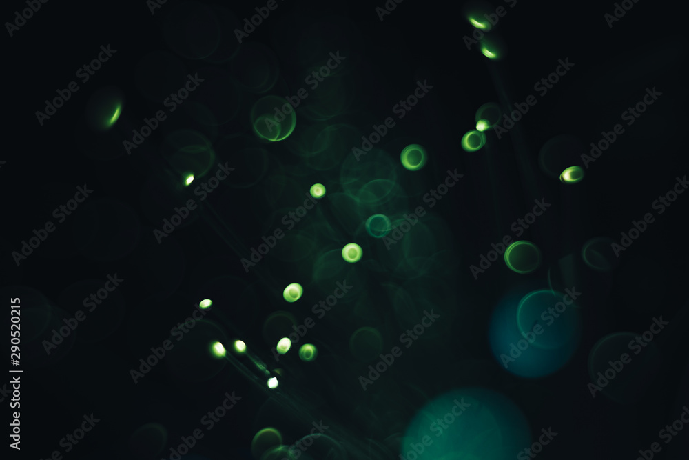 Poster beautiful color light bokeh on a dark abstract background.
