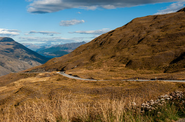 driving in New Zealand with a mountain view
