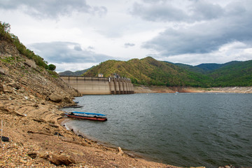 Image of view of bhumibol dam in tak Thailand. Hydro Power Electric Dam and is the first multipurpose dam in thailand and is water storage for agriculture and electricity.. The curved concrete dam.